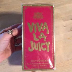 Brand new, never opened, still in cellophane.  3.4 oz Viva La Juicy.